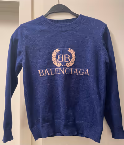Balenciaga logo wool royal blue sweater. Extra small. It belonged to my daughter. Asking $40, OBO. C...
