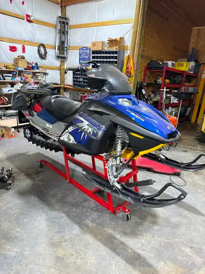 06 summit. Good shape. Runs but been parked. May need carbs cleaned.