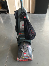 Used Bissell carpet cleaner with attachments