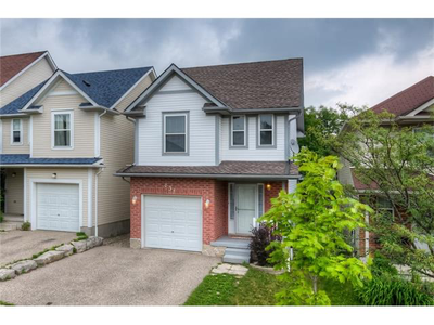 Fenced yard with grass, deck, close to public and high school, bus route.