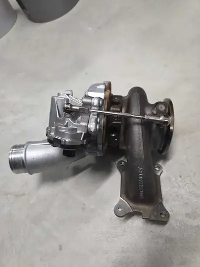 This is a used OEM turbocharger from a 2024 Volkswagen Golf R. It's in good working condition and re...