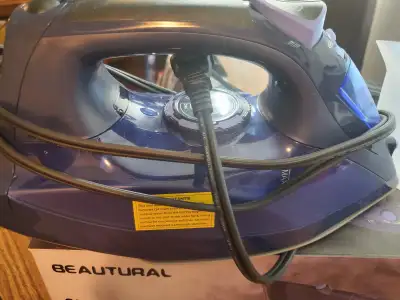 Steam Iron as new, View more