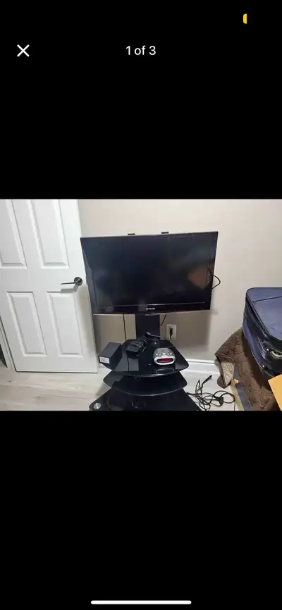  32” Samsung TV with Glass Trolley Stand - $50, View more
