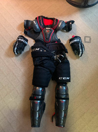 Near new Hockey equipment gloves shoulder pads pants knee pads