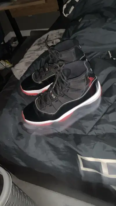 Jordan bred 11 size 10, View more