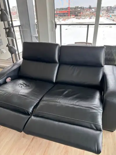Black leather with white top stitching  with power recline, View more