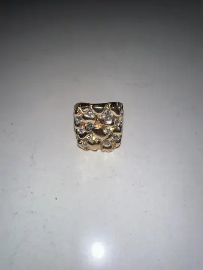 Purchased and appraised by Golden Hand Jewelry Gold diamond nugget ring 10KT yellow gold 2.60ct of d...