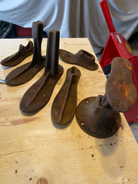 Antique shoemakers cobblers and anvils