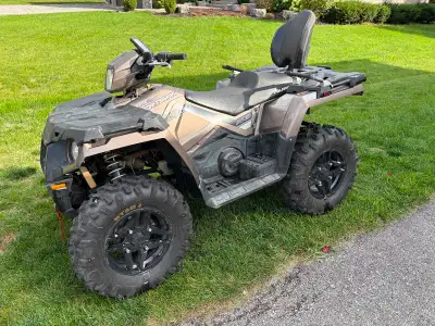 Two Polaris 570 both 2up played with low kms in great shape includes trailer and slow plow for one m...