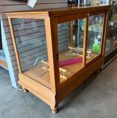Early 1900s oak and glass general store display/counter case., View more
