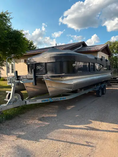 Tritoon Very Safe Very Clean Lots of fun when we had time to use it Very little hours on it