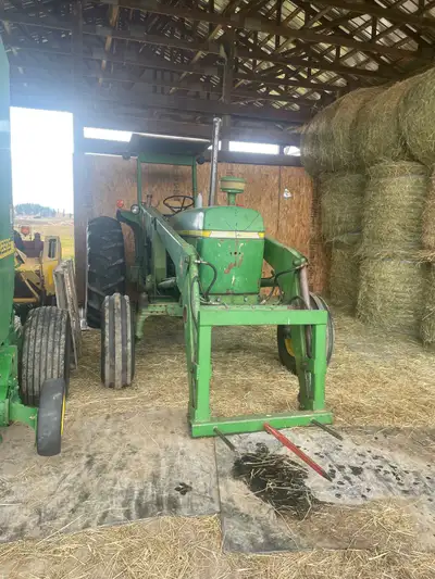 3130 John Deere tractor 90HP. Case 930 tractor 85HP. Both in good condition. Old wooden wagon, compl...