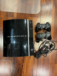 PlayStation 3 with 2 controllers and games