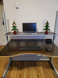 Sell second hands IKEA computer desk as seen. CAD $150.oo cash.