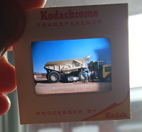 KODAK SLIDE PHOTO 1964 CHEVY IMPALA UNDER GIANT DUMP TRUCK