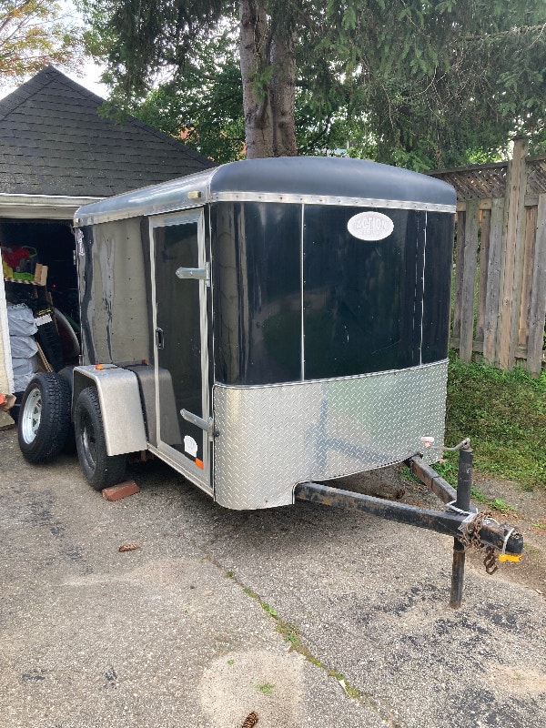 5x8 enclosed cargo trailer with side door and new tires and rims Cargo & Utility Trailers