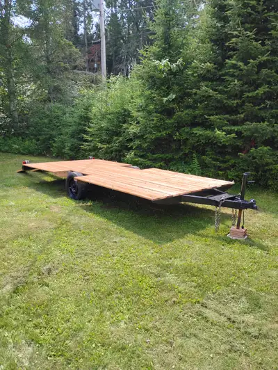7 feet wide, 15 feet bed, 18 feet total length, 6 foot rear loading ramps. Axle rated to 3500 lbs pe...