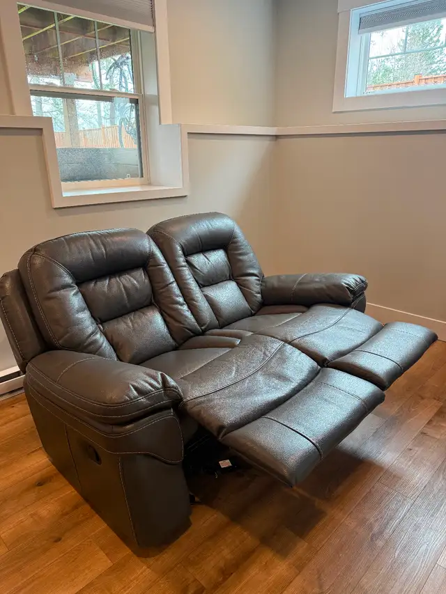 Leather reclining and rocking sofa. in Chairs & Recliners in Charlottetown - Image 5