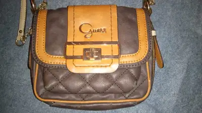 Hello I'm selling this Guess purse or Hand Bag for say so please if your interested in buying this o...