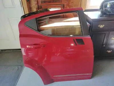 Rear passenger side door from 2013 Dodge Avenger. Rust damage in bottom corner. Asking $100, pick up...
