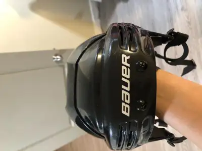 Bauer junior hockey helmet without the grill. In good condition.