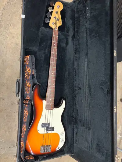 Fender Squire Bass Guitar and Case Comes with two straps a cable, fret board notation book, picks an...