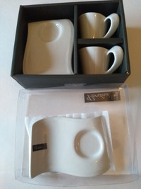 Espresso cups with dish for biscotti