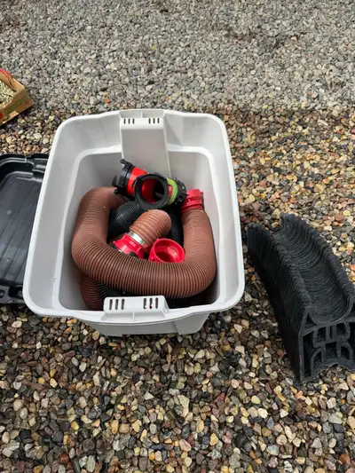I am selling a collection of RV septic tank hoses and connectors, all in used condition but fully fu...