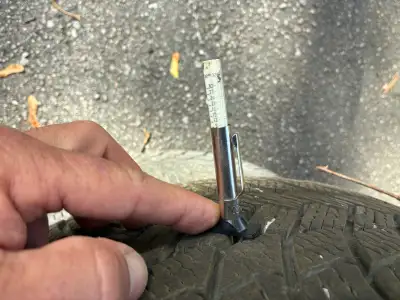 Winter tires on aluminum rims with TPMS sensors. Michelin X-Ice tires. 9-10/32nds remaining on tread...