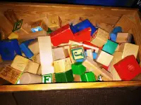 CHILDS TOY BOX FULL OF WOODEN BLOCKS