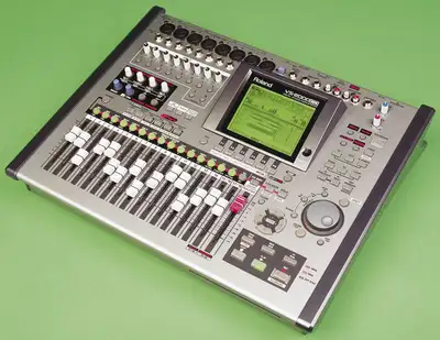 A Roland VS2000CD, an all-in-one digital recording studio. Contains inputs, effects, mixing, masteri...