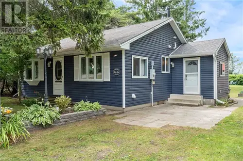 4-season Retreat on sought-after Woodstock Avenue in Long Point, Ontario. Nestled on the north side...