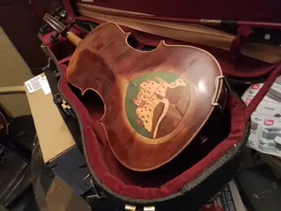 I can't find the maker on this old Stradiuvarius copy. Beautiful marquetry inlay. Antonius Stradiuva...