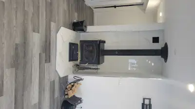 Wood stove good condition 2 gasket for door and Windows new 2025 , ready for go and my garage. No pi...