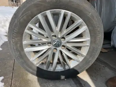 235/55R17 Bridgestone Summer tires approx 50% used on original VW Tiguan alloy wheels (Good conditio...