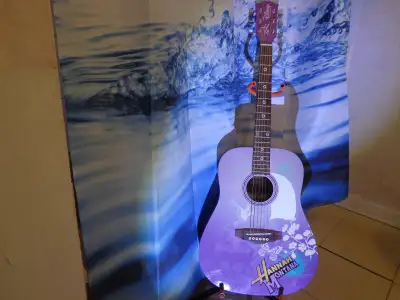 Acoustic guitar in good condition ready to play Leave your # and time you want to come by