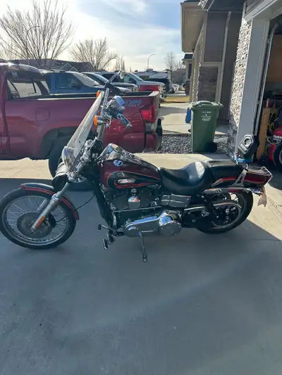 2007 Wide Glide, 50K kms, runs and rides great. Was dropped comes with replacement tank. New tires(2...