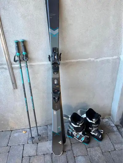 Skiis, sticks, helmet and boots, View more