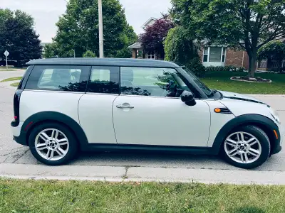 Well maintained Leather interiors 6 speed manual Winter tires on rims included Original mini floor m...