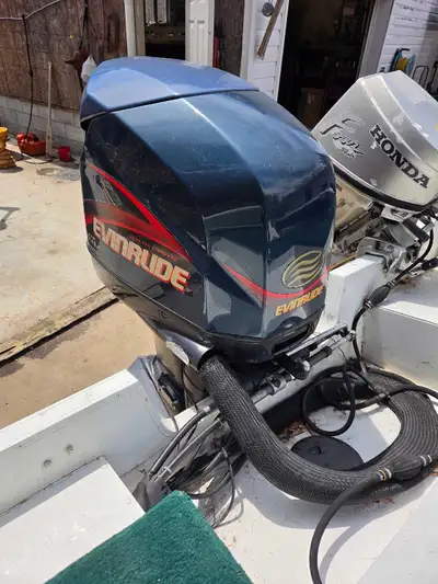 Good working and running 135hp Evinrude outboard 2 stroke. No issues. Power trim and tilt. Can be wa...