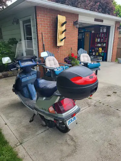 1985 honda150 elite scooter 14000 kilometers new tires comes with cover 700 or best offer as is phon...