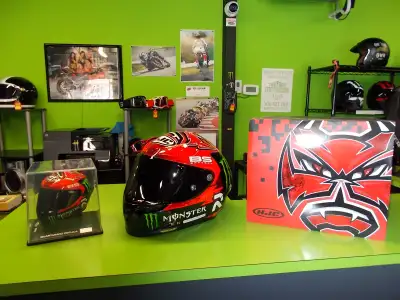 Super cool helmet and matching replica helmet combo. Helmet is optioned with a dark visor to match t...