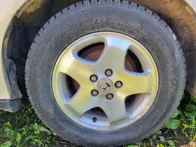 Very good condition winter tires used for only 4 months. On aluminum alloy rims . Rims fit 2nd gen H...