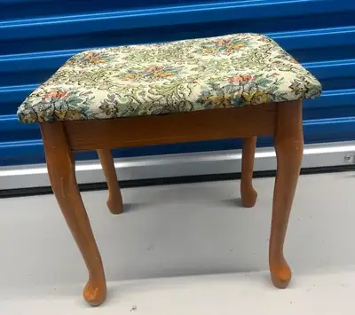 This petite seat/footstool features a tapestry-covered seat and stands on elegantly curved wooden le...