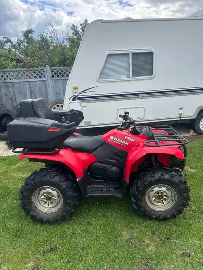 Great quad, never gave me an issue. 4x4 with button for diff lock. Has winch and storage box. 2800km...