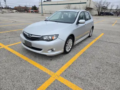 Selling a 2011 Subaru Impreza Limited 5-speed manual in good condition with 145,000 kilometres. Mess...