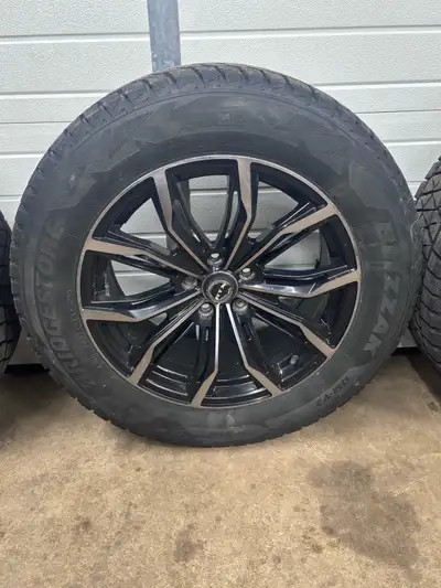 Set of 4 Bridgestone blizzak tires 245/60r18 on aftermarket sport rims excellent condition 80% tread...