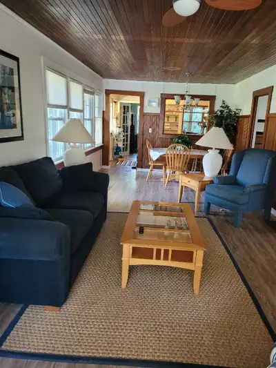Walk to beach in 3 minutes from this large family cottage. 3 bedrooms, living room with fireplace, l...