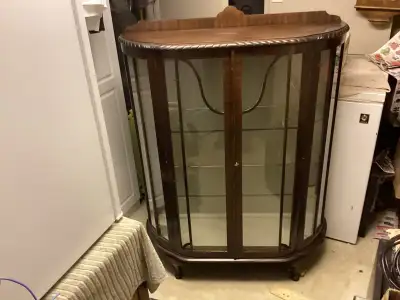 Cabinet with glass doors 40” wide x48” high. With bottom shelf & two glass shelf’s very sturdy $35.0...