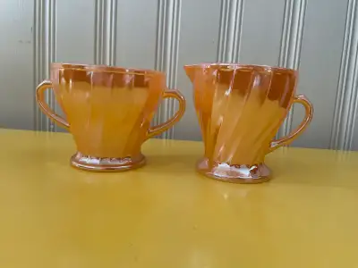 Matching cream pitcher and sugar bowl by Anchor Hocking. In Lustre peach style. Start or continue co...